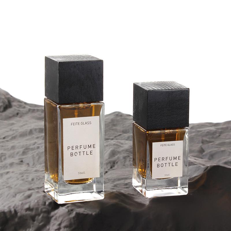 30ML 50ML Cuboid Glass Snap-on Spray Empty Perfume Bottles with Wooden Lids for Wholesale,lmxi empty perfume bottle suppliers,perfume bottle manufacturers